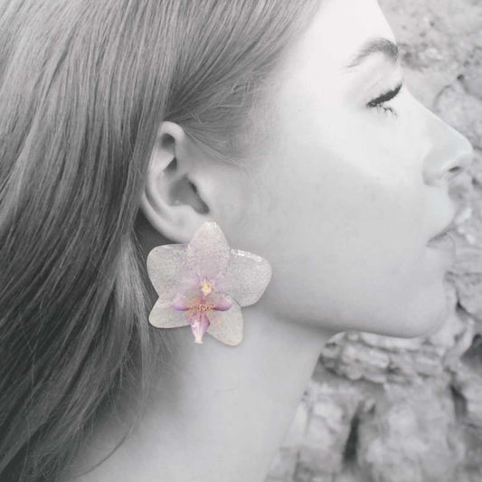 Vista alternativa de Pendientes Colombia con orquídeas naturales