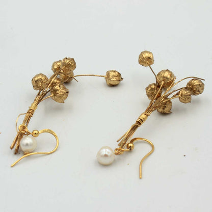 Acabado artesanal de Pendientes Lino con flores naturales preservadas