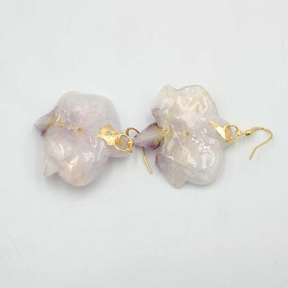Vista completa de Pendientes Delikatessen con orquídeas naturales